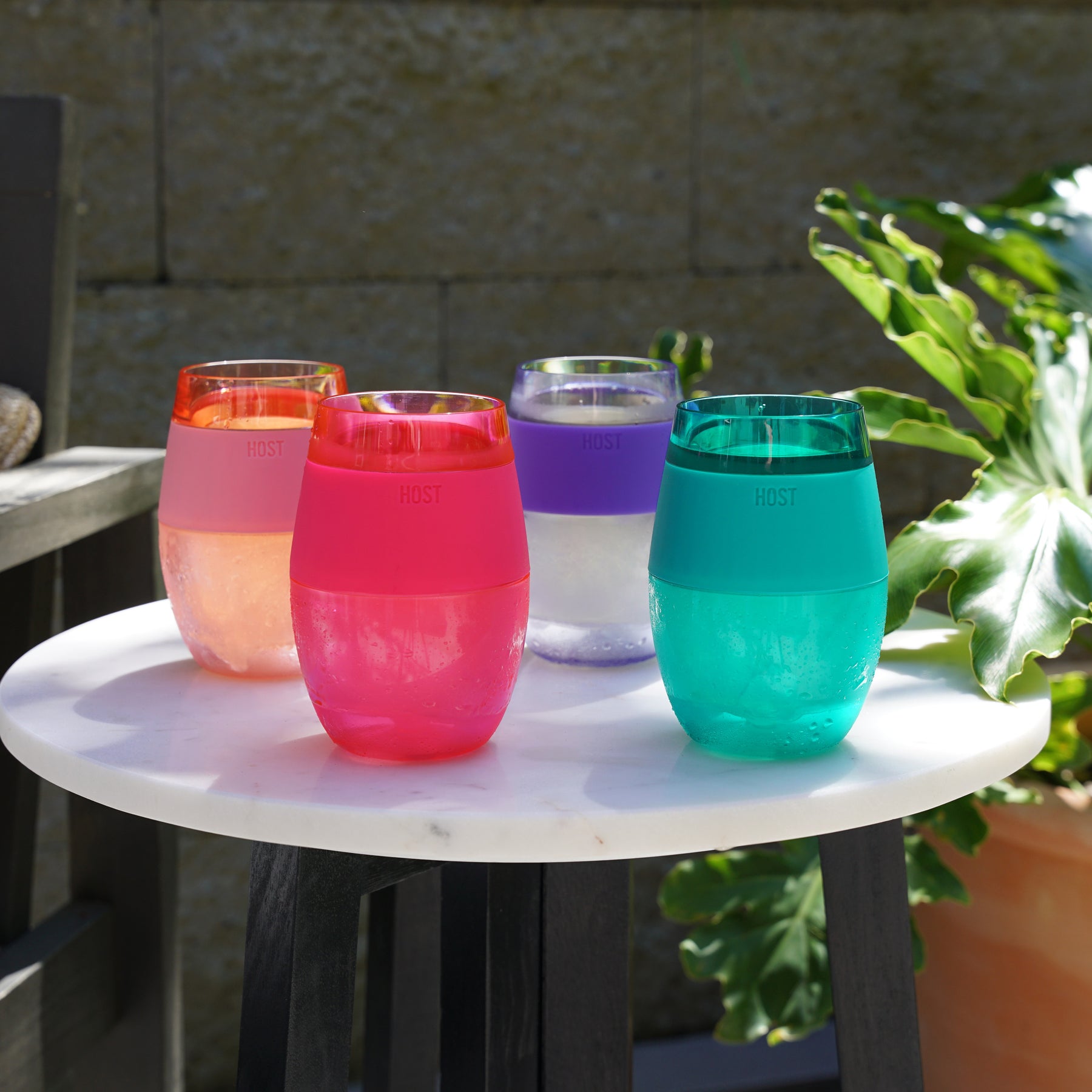 BPA-FREE PLASTIC construction is sturdy and perfectly suited for outdoor use, An insulated silicone band makes for comfortable handling and ensures that this stemless wine glass set will be your favorite new wine accessories. Hand wash only.