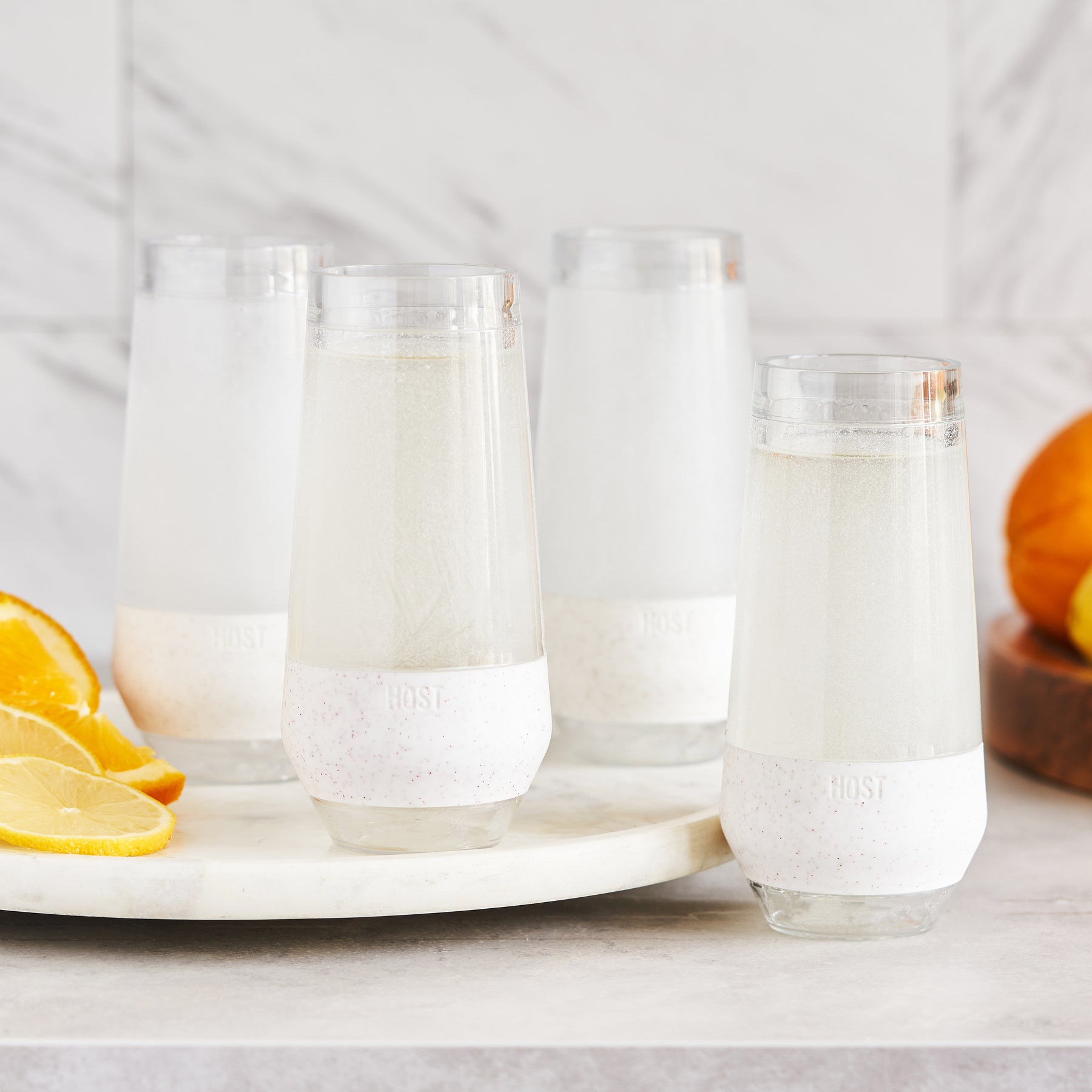 DOUBLE-WALLED BPA-FREE PLASTIC WITH INSULATED SILICONE BAND - Sturdy plastic construction makes the Champagne FREEZE perfectly suited for outdoor use and a silicone band makes for comfortable handling. It’s your new favorite wine accessory.