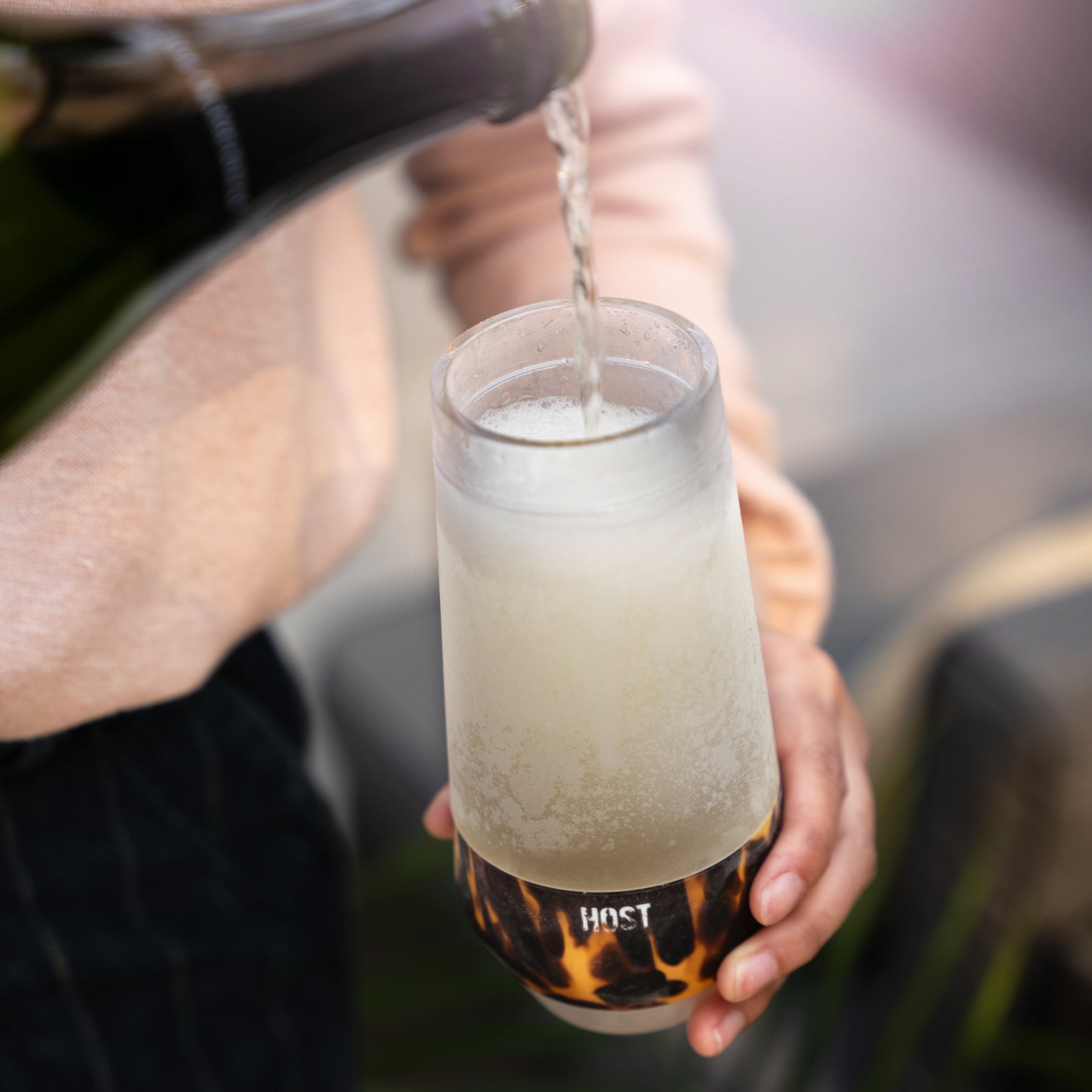 DOUBLE-WALLED BPA-FREE PLASTIC WITH INSULATED SILICONE BAND - Sturdy plastic construction makes the Champagne FREEZE perfectly suited for outdoor use and a silicone band makes for comfortable handling. It’s your new favorite wine accessory.