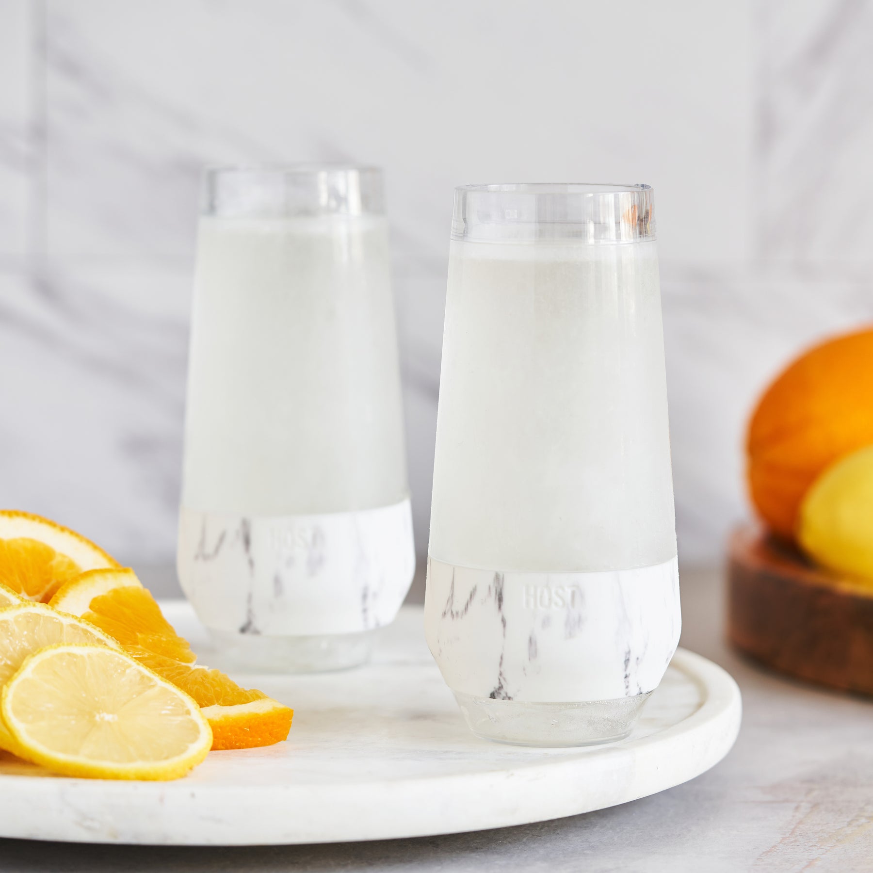 DOUBLE-WALLED BPA-FREE PLASTIC WITH INSULATED SILICONE BAND - Sturdy plastic construction makes the Champagne FREEZE perfectly suited for outdoor use and a silicone band makes for comfortable handling. It’s your new favorite wine accessory.